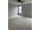 Bright bedroom featuring a ceiling fan and a window overlooking the outdoors, perfect for relaxation at 1433 Wigwam Ln, Martinsville, IN 46151