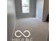 This bedroom offers neutral walls and natural light at 1433 Wigwam Ln, Martinsville, IN 46151