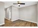 Spacious bedroom with luxury vinyl floors and modern ceiling fan at 1622 Prospect St, Indianapolis, IN 46203