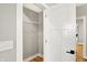 Open closet with shelf and hanging rod, providing ample storage space at 1622 Prospect St, Indianapolis, IN 46203