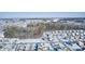 Aerial view of neighborhood with houses and a wooded area in winter at 2959 Hearthside Dr, Greenwood, IN 46143