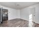 Bright bedroom with hardwood floors and access to another room at 2959 Hearthside Dr, Greenwood, IN 46143