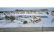Community pool and clubhouse in a snow covered neighborhood at 2959 Hearthside Dr, Greenwood, IN 46143