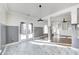 Bright dining area with tile floors and French doors at 2959 Hearthside Dr, Greenwood, IN 46143