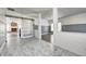 Open concept entryway with barn door, hardwood and tile floors at 2959 Hearthside Dr, Greenwood, IN 46143