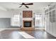 Brick fireplace with a white mantel in a living room at 2959 Hearthside Dr, Greenwood, IN 46143