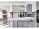 Modern kitchen with gray cabinets and marble countertops at 2959 Hearthside Dr, Greenwood, IN 46143