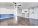 Bright living room with hardwood floors and ample built-in storage at 2959 Hearthside Dr, Greenwood, IN 46143
