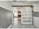 Open living room with a view of a fireplace through a barn door at 2959 Hearthside Dr, Greenwood, IN 46143