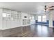 Large living room featuring hardwood floors and extensive built-in shelving at 2959 Hearthside Dr, Greenwood, IN 46143