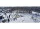 Snowy park with benches and a cleared parking area at 2959 Hearthside Dr, Greenwood, IN 46143