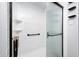 Updated shower with white subway tile and black accents at 2959 Hearthside Dr, Greenwood, IN 46143
