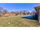 Large backyard with a shed and neighboring homes visible at 4522 Thornleigh Dr, Indianapolis, IN 46226