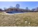 House with a snow covered backyard at 4522 Thornleigh Dr, Indianapolis, IN 46226