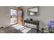 Bright entryway with wood door and stylish console table at 4522 Thornleigh Dr, Indianapolis, IN 46226