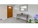 Welcoming entryway with a console table and mirror at 4522 Thornleigh Dr, Indianapolis, IN 46226