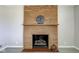 Classic brick fireplace, perfect for cozy nights at 4522 Thornleigh Dr, Indianapolis, IN 46226