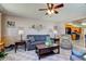 Spacious living room featuring a ceiling fan and hardwood floors at 4522 Thornleigh Dr, Indianapolis, IN 46226