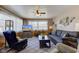 Bright living room with comfy seating and a large TV at 4522 Thornleigh Dr, Indianapolis, IN 46226