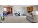 Spacious living room with fireplace and view to dining area at 4522 Thornleigh Dr, Indianapolis, IN 46226