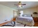 Spacious main bedroom with wood floors and a ceiling fan at 4522 Thornleigh Dr, Indianapolis, IN 46226