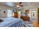 Main bedroom with a king bed and en-suite bathroom access at 4522 Thornleigh Dr, Indianapolis, IN 46226