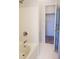 Bright bathroom features a tiled shower and a spacious closet at 6442 E Flat Rock Dr, Camby, IN 46113
