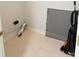 A utility room with a tile floor at 6442 E Flat Rock Dr, Camby, IN 46113