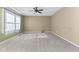 Bright living room with neutral walls and carpeting at 7609 Samuel Dr, Indianapolis, IN 46259