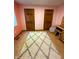 Bright bedroom with hardwood floors, a shag rug, and natural wood trim at 797 S Graveyard Rd, Paragon, IN 46166