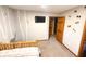 A spacious bedroom showcasing rustic decor and an open doorway, blending comfort with style at 797 S Graveyard Rd, Paragon, IN 46166