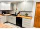 Well-lit kitchen featuring custom butcher block countertops and modern appliances for a gourmet experience at 797 S Graveyard Rd, Paragon, IN 46166