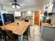 Bright kitchen with an island, updated appliances, ample countertop space, and plenty of storage at 797 S Graveyard Rd, Paragon, IN 46166