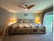 Relaxing main bedroom features a ceiling fan, spacious layout, and ample natural light at 797 S Graveyard Rd, Paragon, IN 46166