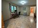 Spacious office area with a large window providing natural light and views at 797 S Graveyard Rd, Paragon, IN 46166