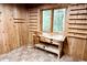 Bright room with wooden walls and a wooden desk next to a window with outdoor view at 797 S Graveyard Rd, Paragon, IN 46166