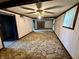 Spacious basement with a fireplace and ceiling fans at 801 Spring Valley Dr, Indianapolis, IN 46231