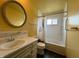 Bathroom with a vanity and tub at 801 Spring Valley Dr, Indianapolis, IN 46231