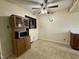 A small kitchen with cabinet and dining area at 801 Spring Valley Dr, Indianapolis, IN 46231