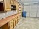 Garage with ample storage, workbench, and cabinets at 7254 Broyles Ln, Indianapolis, IN 46217