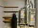 Garage utility area with water heater and HVAC unit at 7254 Broyles Ln, Indianapolis, IN 46217