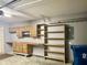 Spacious garage workshop with built-in cabinets and shelving at 7254 Broyles Ln, Indianapolis, IN 46217