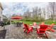 Charming outdoor patio features comfortable seating, a fire pit, and a grill, perfect for entertaining guests at 10866 Flower Mound Pl, Fishers, IN 46037