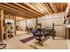 Spacious unfinished basement area, great for a home gym or storage, offers versatility and potential at 10866 Flower Mound Pl, Fishers, IN 46037