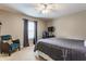 Comfortable bedroom featuring neutral walls, ceiling fan, and stylish furniture, creating a relaxing retreat at 10866 Flower Mound Pl, Fishers, IN 46037