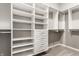 Large walk-in closet with ample shelving and drawers at 1915 Granville Dr, Westfield, IN 46074