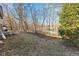 Landscaped backyard with a wooded view at 454 Tulip Dr, Mooresville, IN 46158