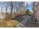 Backyard with patio, walkway, and wooded area at 454 Tulip Dr, Mooresville, IN 46158