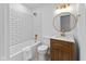 Clean bathroom with white subway tile and gold fixtures at 454 Tulip Dr, Mooresville, IN 46158