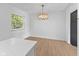 Bright dining room with hardwood floors and chandelier at 454 Tulip Dr, Mooresville, IN 46158